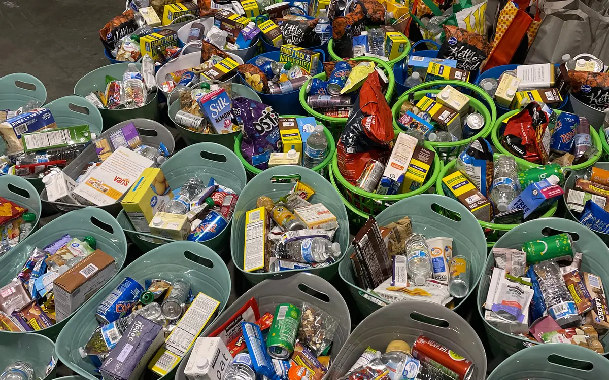 Baskets filled with snacks, drinks and essentials for neighbors in need